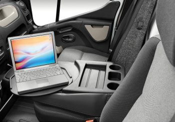 renault-master-desk-sm The middle passenger seat folds down into a desk - very useful for butties and paperwork