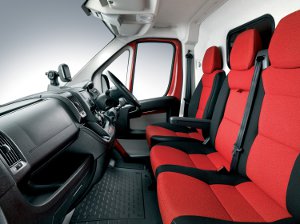 New Fiat Ducato interior showing upgraded cab seats with red fabric