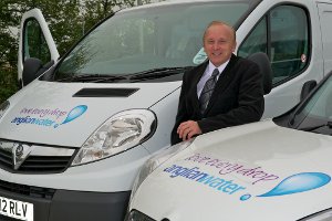 Anglian Water fleet manager Nigel Allen with Anglian's new Vauxhall vans